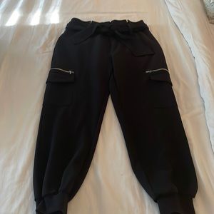 Black cargo ankle pant w/ matching belt. NY & Company size M.